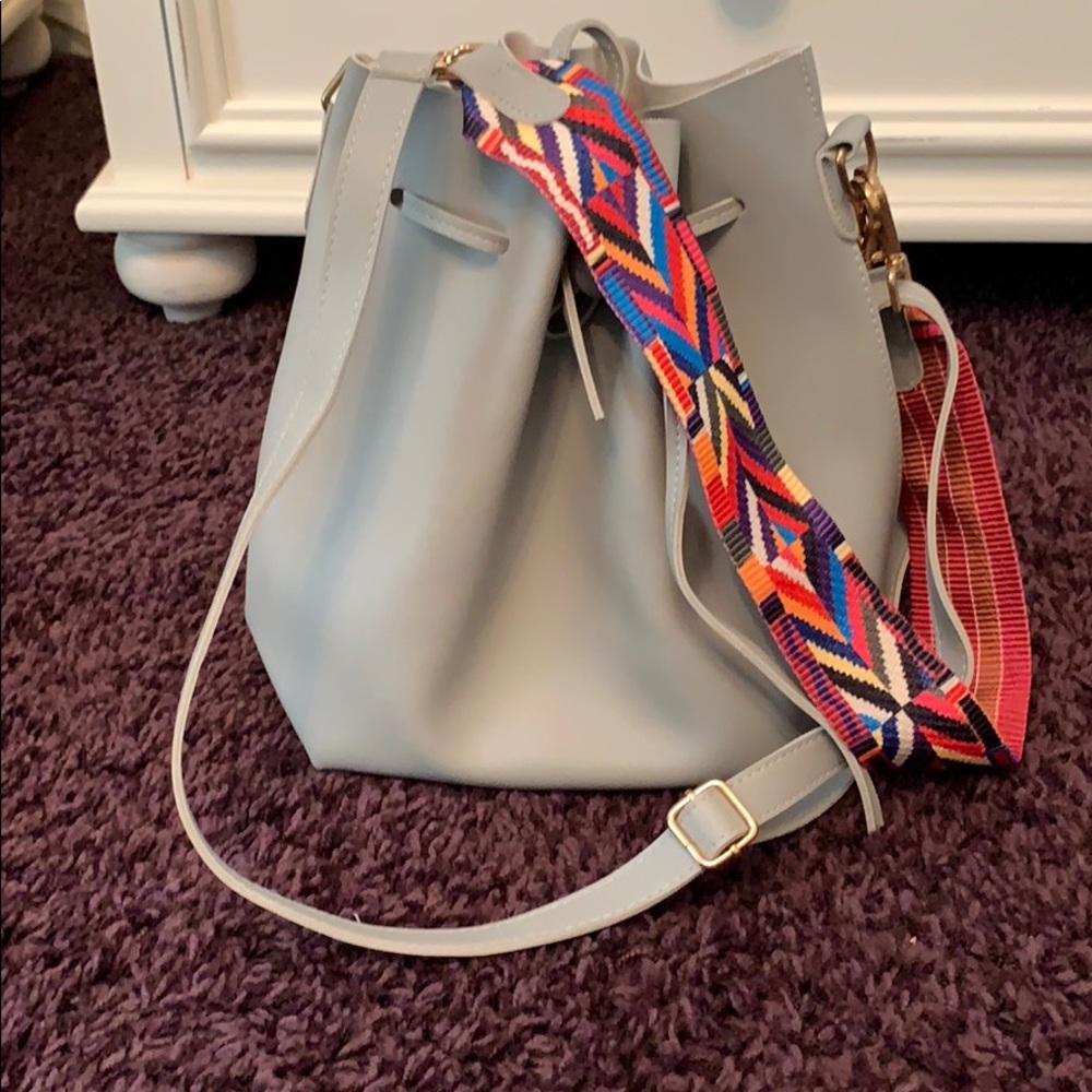 Grey bucket back with patterned strap!